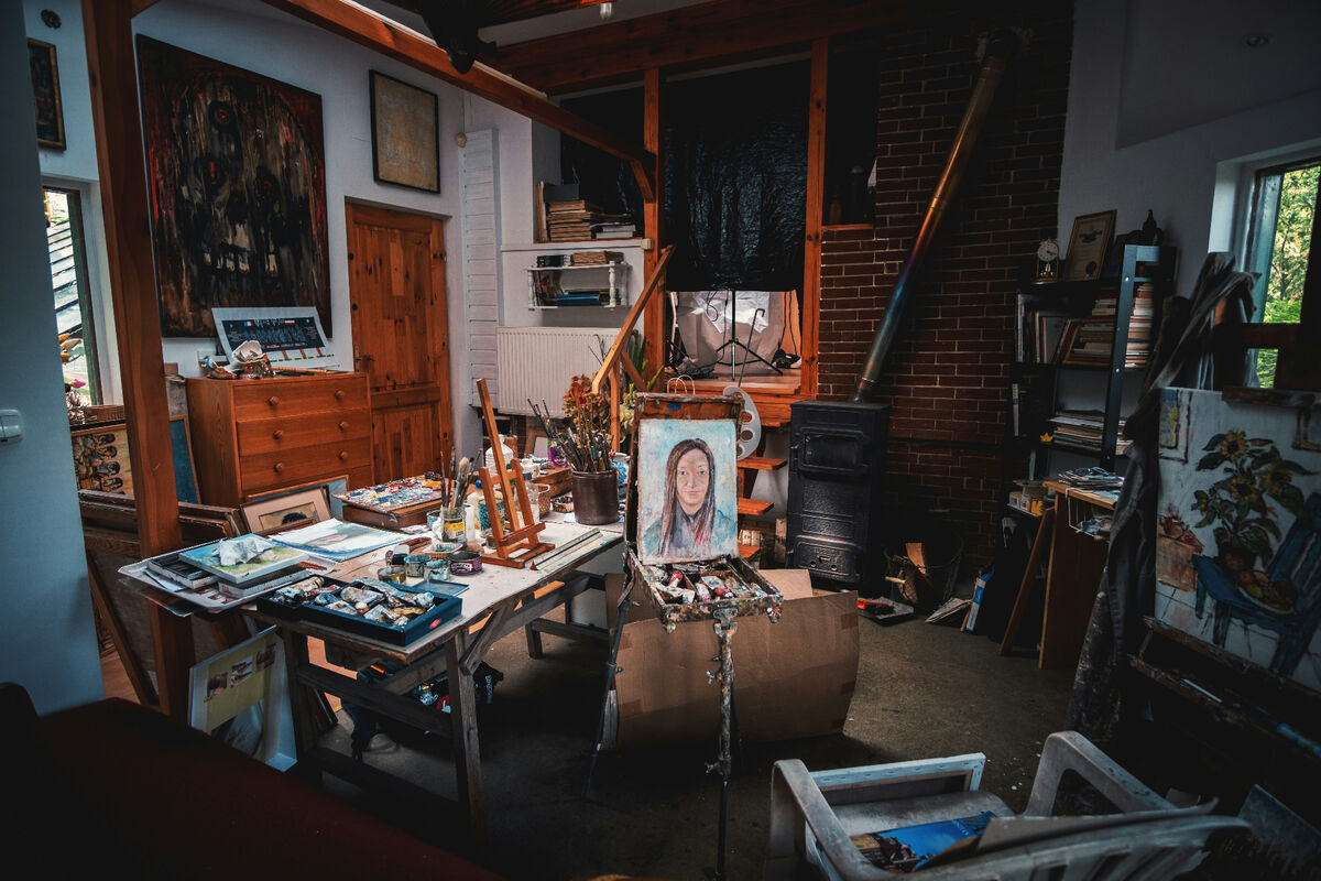 Artist's studio with works in progress — connect directly with creators

